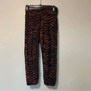 The Upside navy  orange tiger leggings